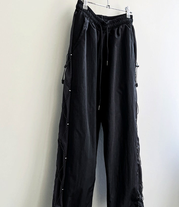 cross string nylon pants