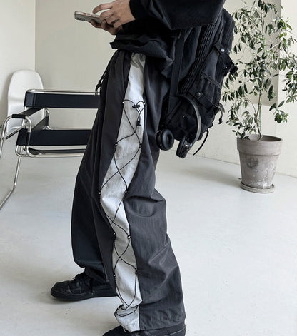 cross string nylon pants