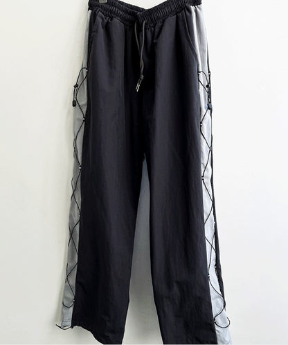 cross string nylon pants