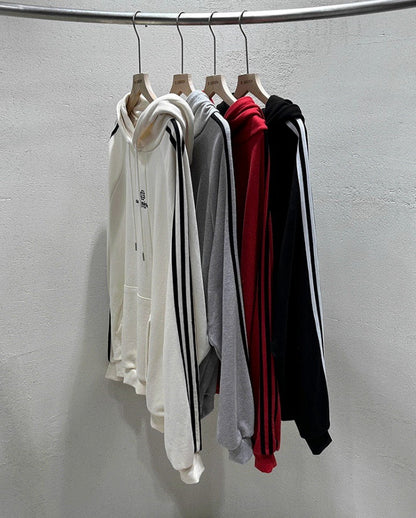 Outside track over hoodie