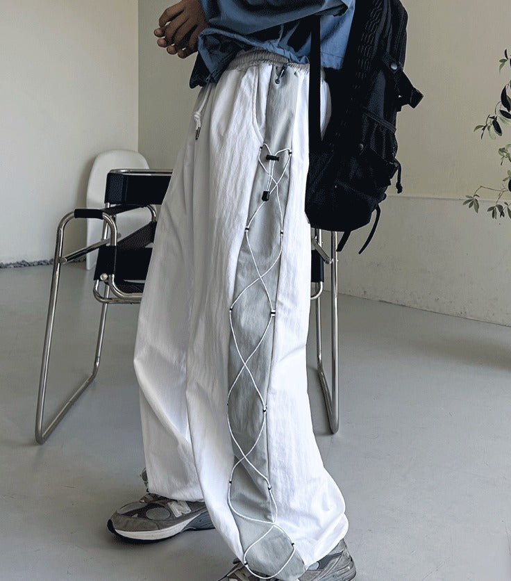 cross string nylon pants