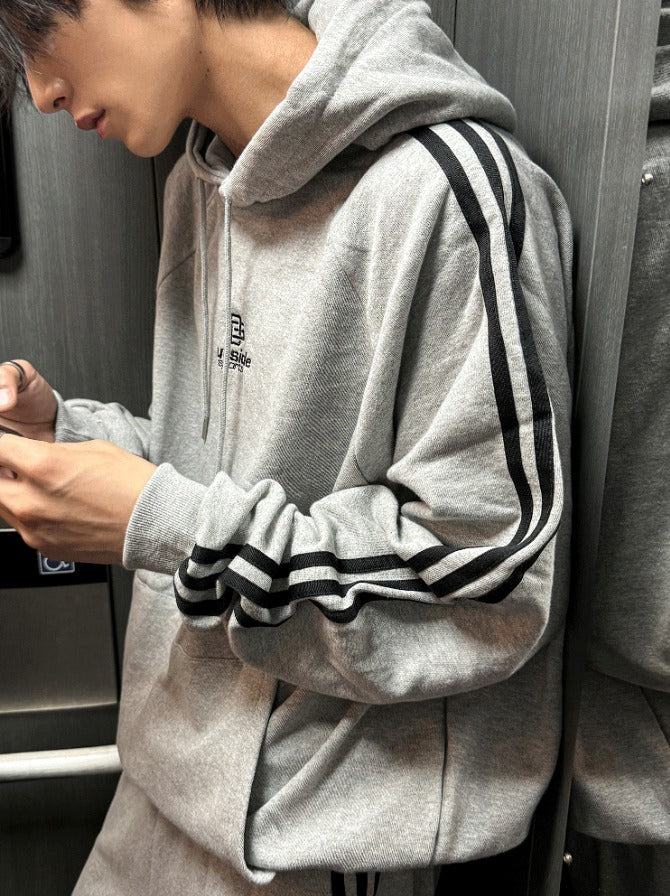 Outside track over hoodie