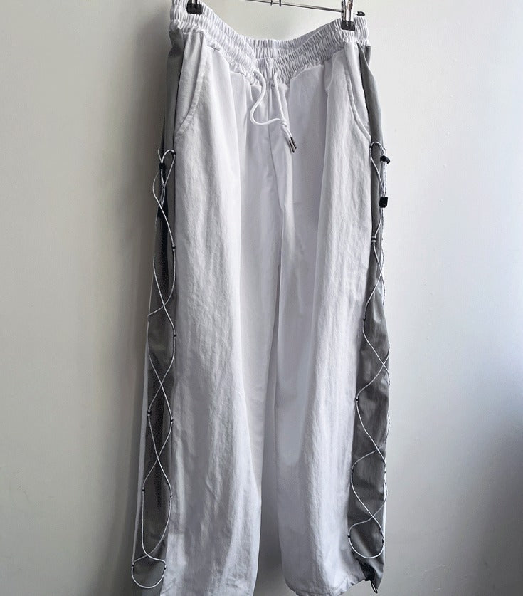 cross string nylon pants