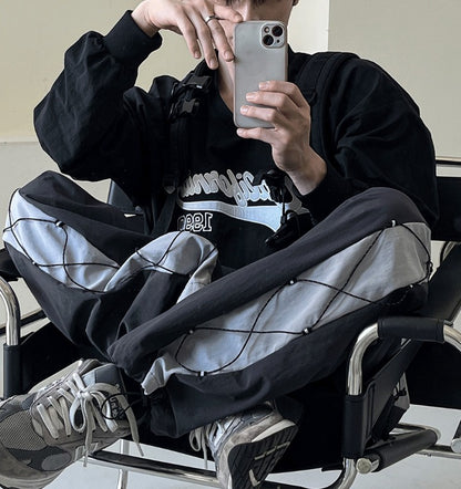 cross string nylon pants