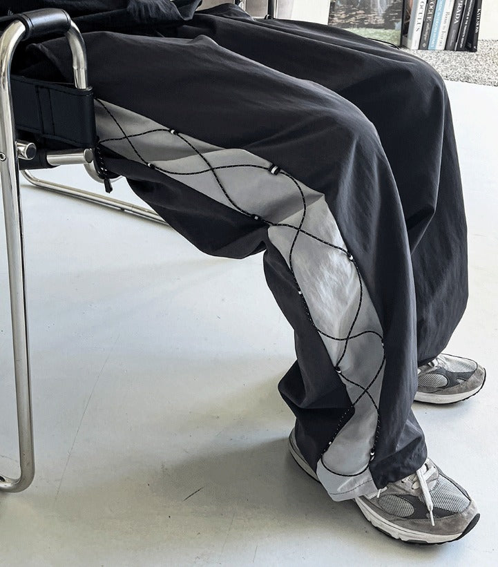 cross string nylon pants